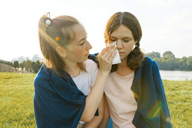 A couple of sisters giving each other support