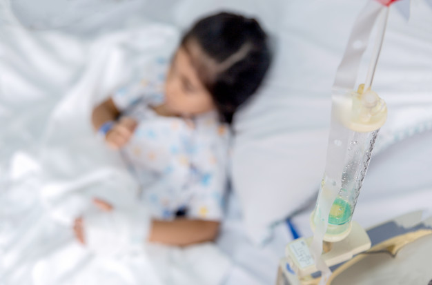 Girl receiving chemo