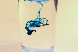 Ink inside a glass of water