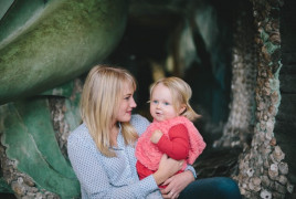 Mum holding kid 