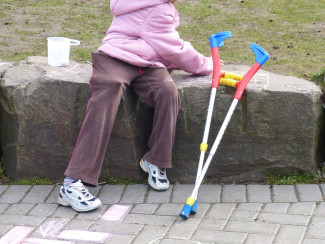 Child with crutches