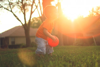 Boy playing with a ball