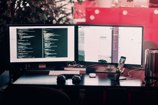 Idea behind the technical design of Share4Rare Two computer screens, one is programming