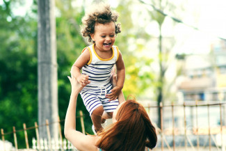 Child and mother playing Thiago Cerqueira Brazil
