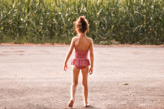 Girl summer sun cornfield