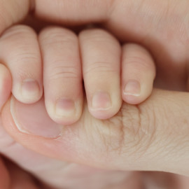 Child and mother hands Child and mother hands